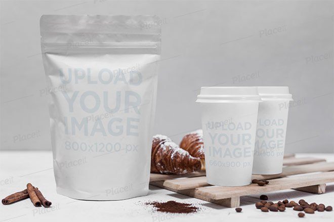 Packaging Mockup Featuring a Zip Bag and Two Coffee Cups